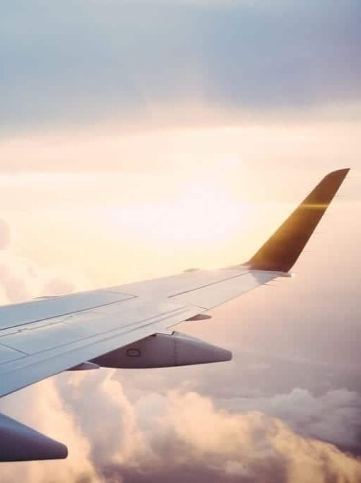 Plane Wing against blue sky